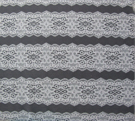 Tissu sur toute la surface blanc de dentelle de tissu élastique de dentelle