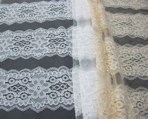 Tissu sur toute la surface blanc de dentelle de tissu élastique de dentelle