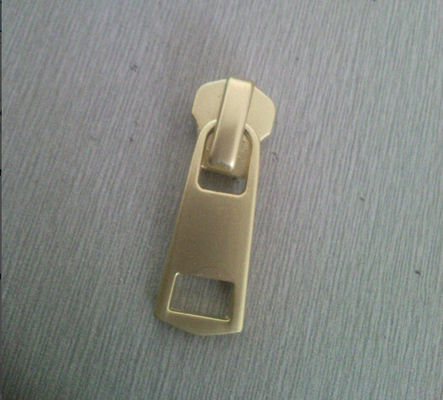 Glisseur fait sur commande de tirette d'or